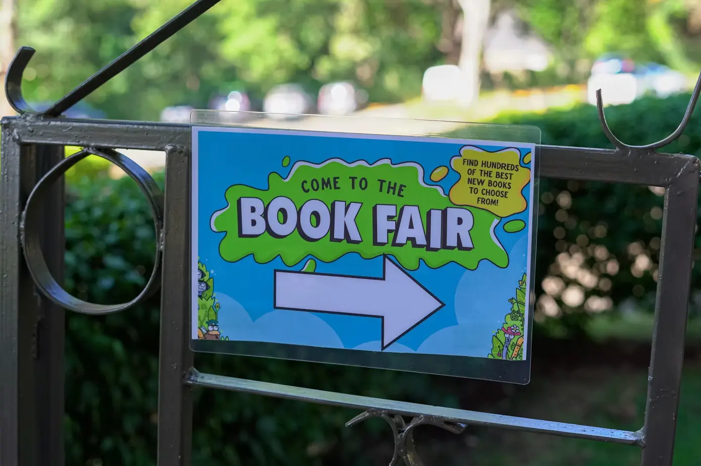 A sign welcoming families to a school book fair
