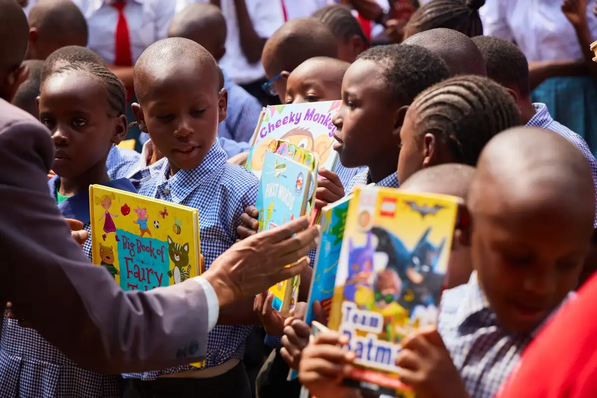 Young readers choosing colourful books together